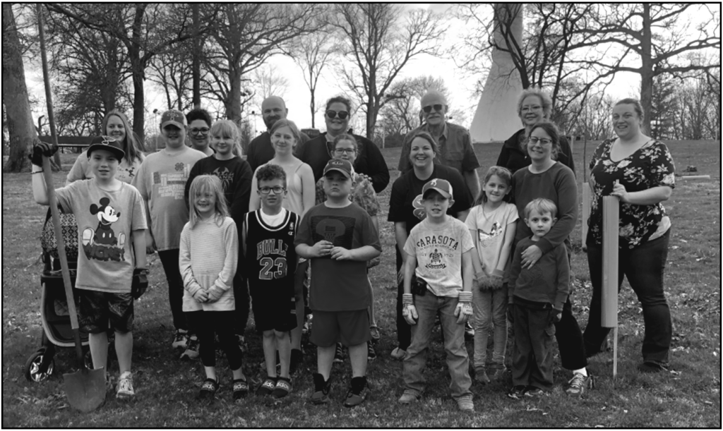 On Monday, April 3, 2023, 4-H youth, 4-H Volunteers, the Coles County Soil & Water Conservation District, a Master Naturalist, and Community members of Coles County planted 25 Oak trees at Water Tower Park in Oakland, Illinois.